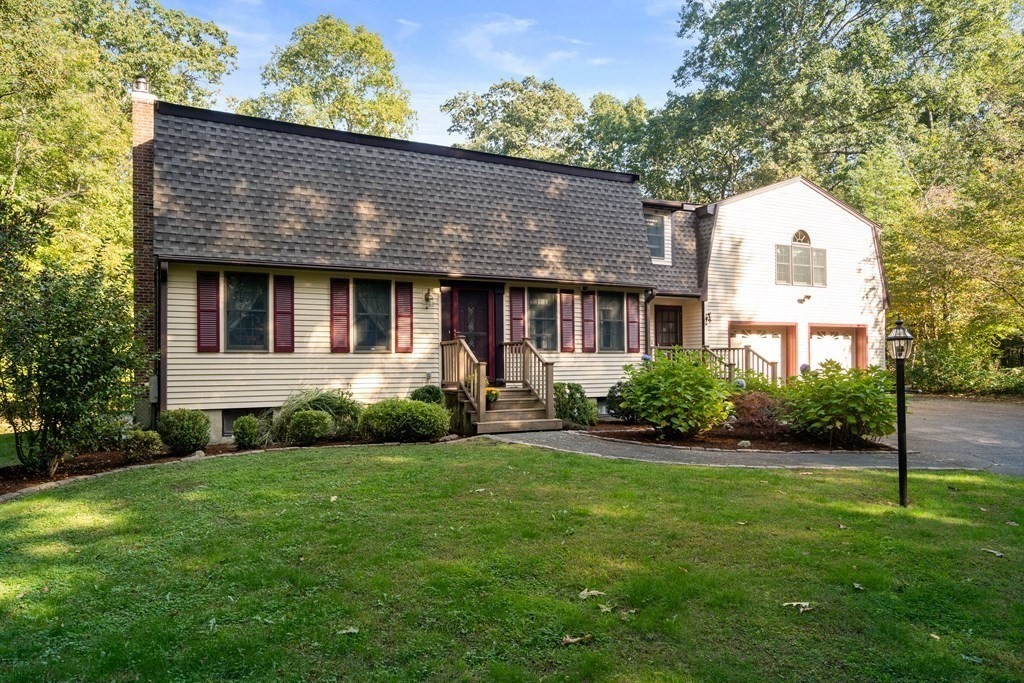 22 Robbin Road Canton, MA 02021 - Photo 40 of 40 a front view of a house with a yard and garage