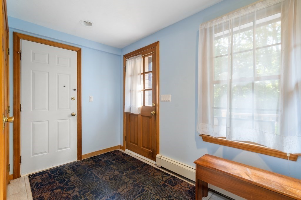 22 Robbin Road Canton, MA 02021 - Photo 4 of 40 a view of room with windows and wooden floor