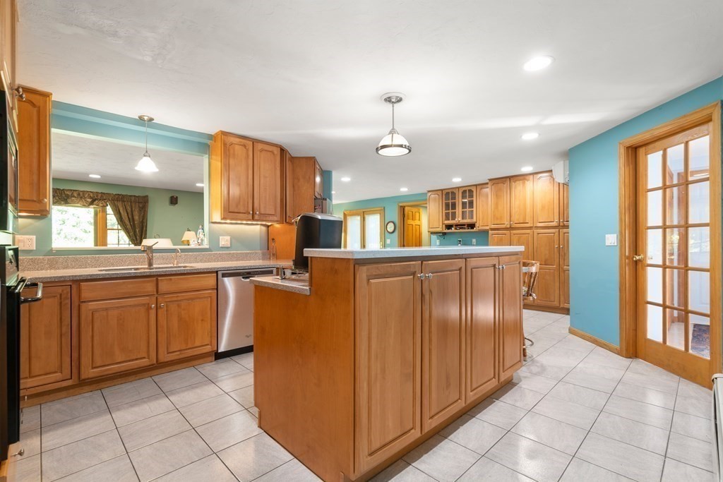 22 Robbin Road Canton, MA 02021 - Photo 6 of 40 a kitchen with stainless steel appliances granite countertop a refrigerator and a sink