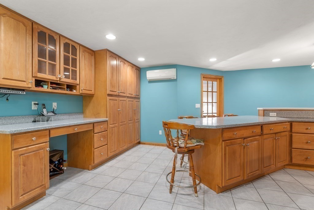 22 Robbin Road Canton, MA 02021 - Photo 8 of 40 a kitchen with stainless steel appliances granite countertop a sink and cabinets