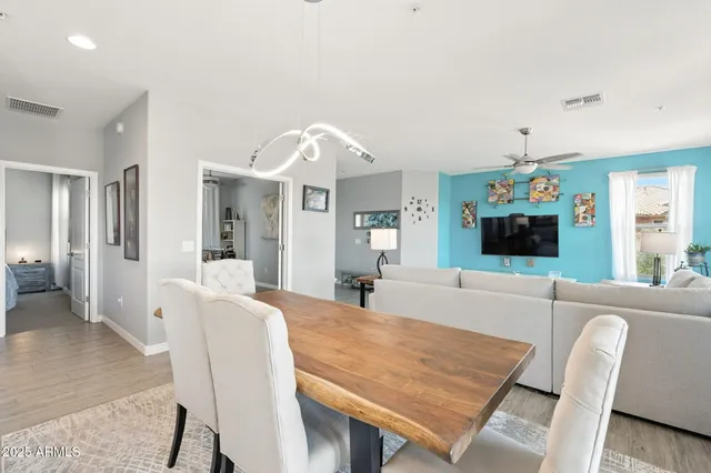 a living room with a couch and a bookshelf
