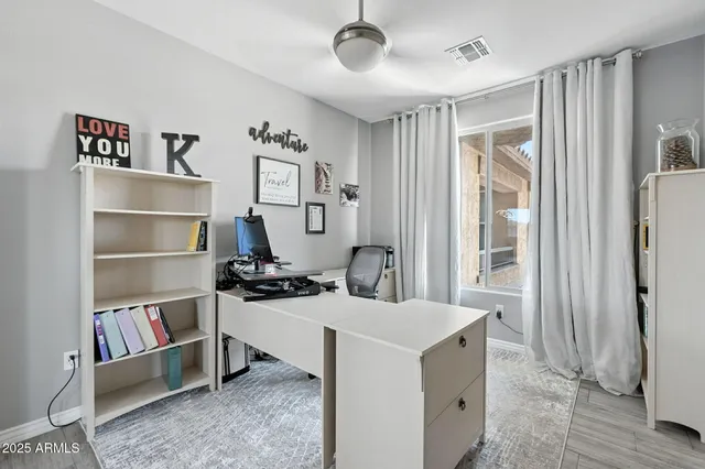 a room with furniture and a flat screen tv