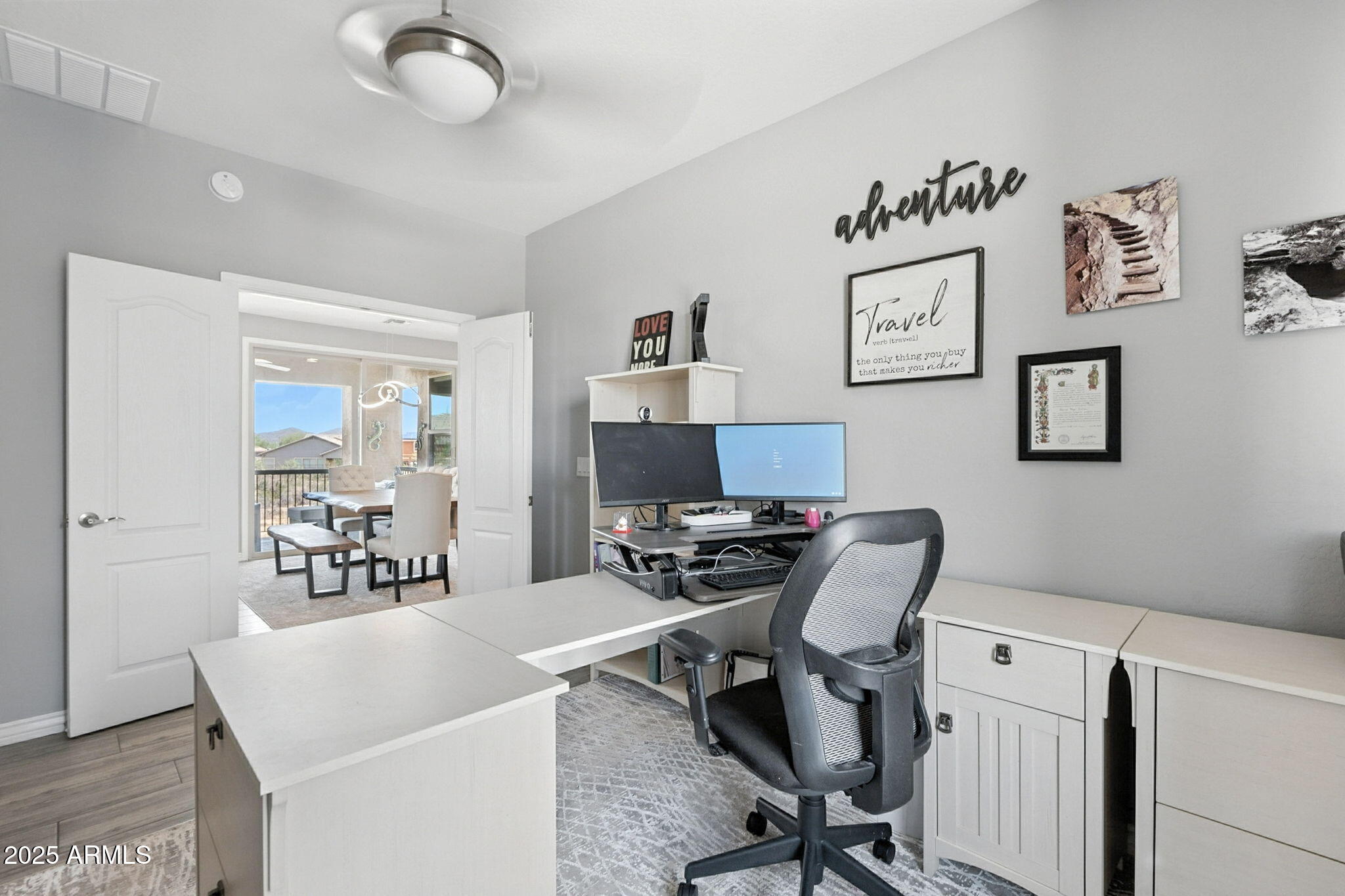 2425 West Bronco Butte Trail, Unit 2014 Phoenix, AZ 85085 - Photo 20 of 32 a work room with furniture and a window