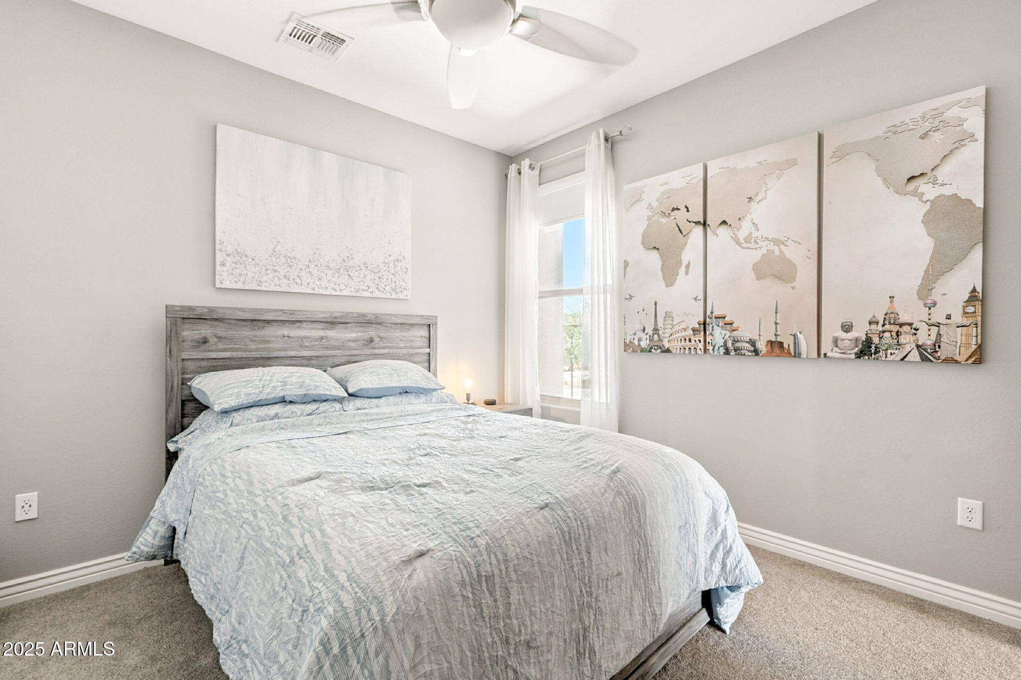2425 West Bronco Butte Trail, Unit 2014 Phoenix, AZ 85085 - Photo 24 of 32 a bedroom with a bed and a window