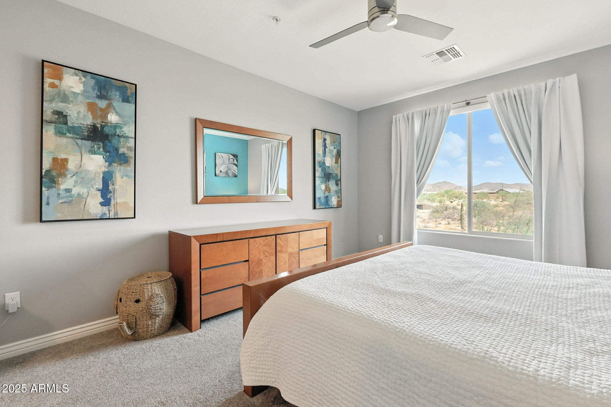 2425 West Bronco Butte Trail, Unit 2014 Phoenix, AZ 85085 - Photo 26 of 32 a bedroom with a bed and a window