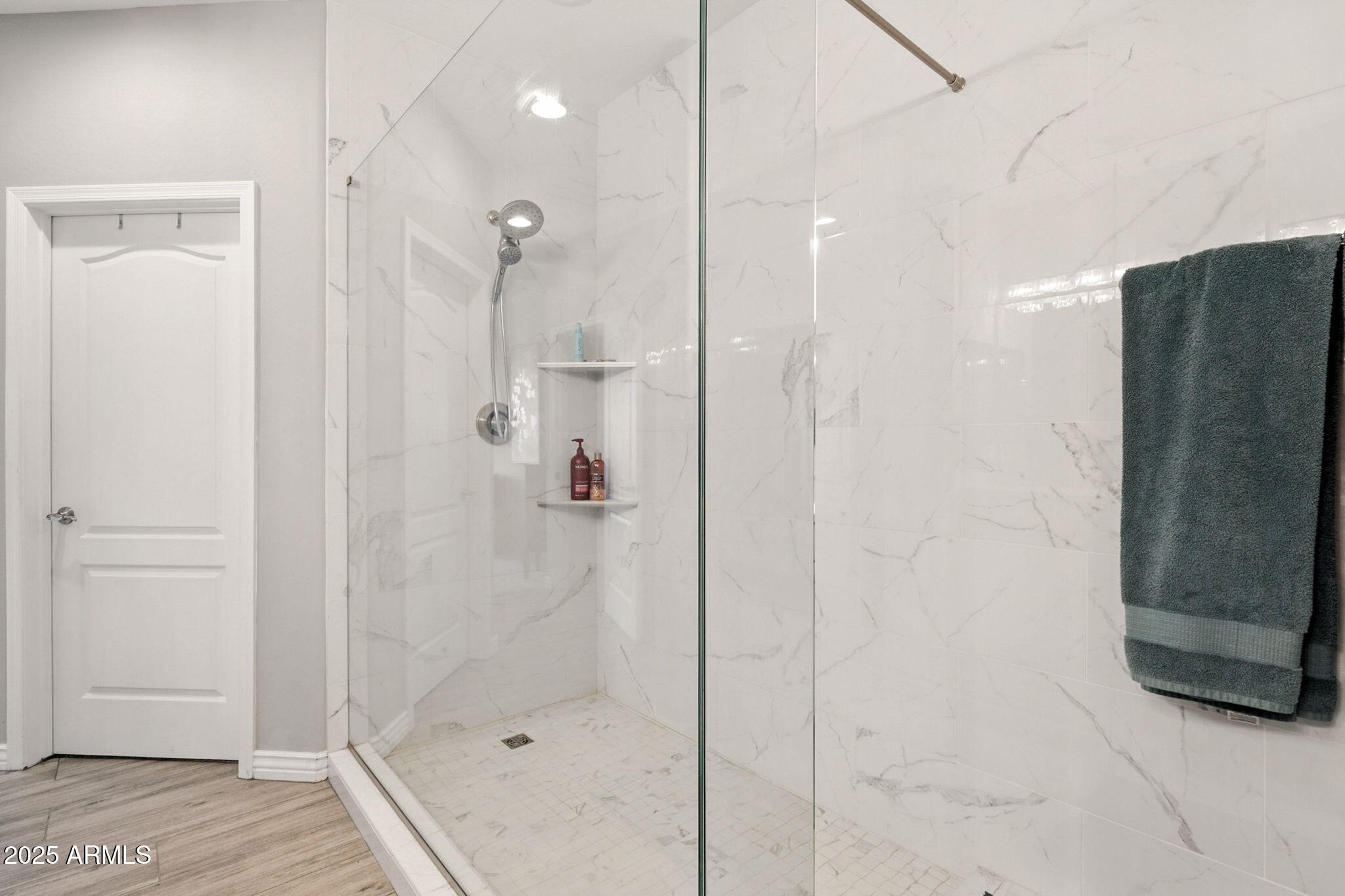 2425 West Bronco Butte Trail, Unit 2014 Phoenix, AZ 85085 - Photo 29 of 32 a bathroom with a shower and a sink