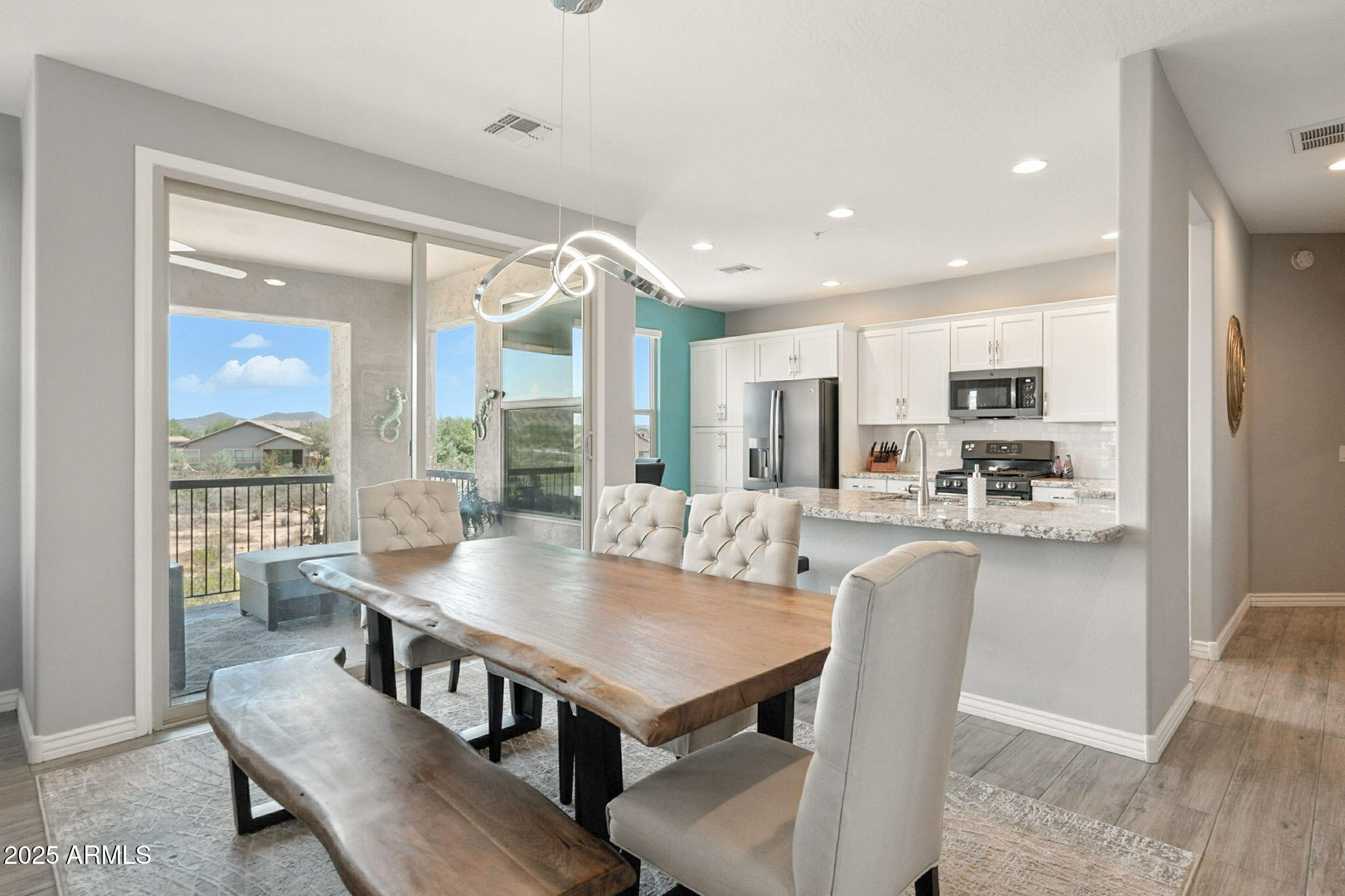 2425 West Bronco Butte Trail, Unit 2014 Phoenix, AZ 85085 - Photo 9 of 32 a view of kitchen with dining area