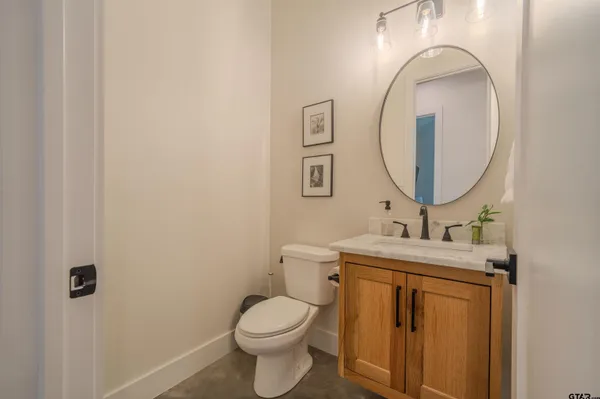 a view of a hallway with seating area