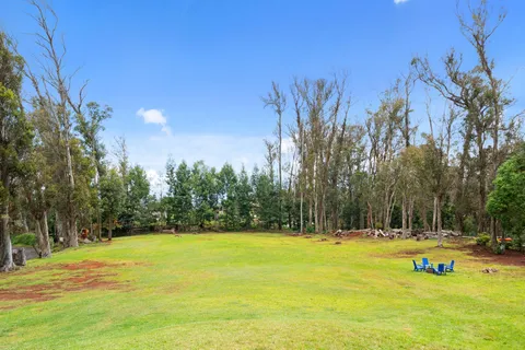 a view of swimming pool with an outdoor space and seating area