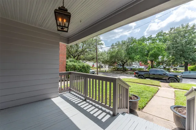 a view of a balcony with chairs