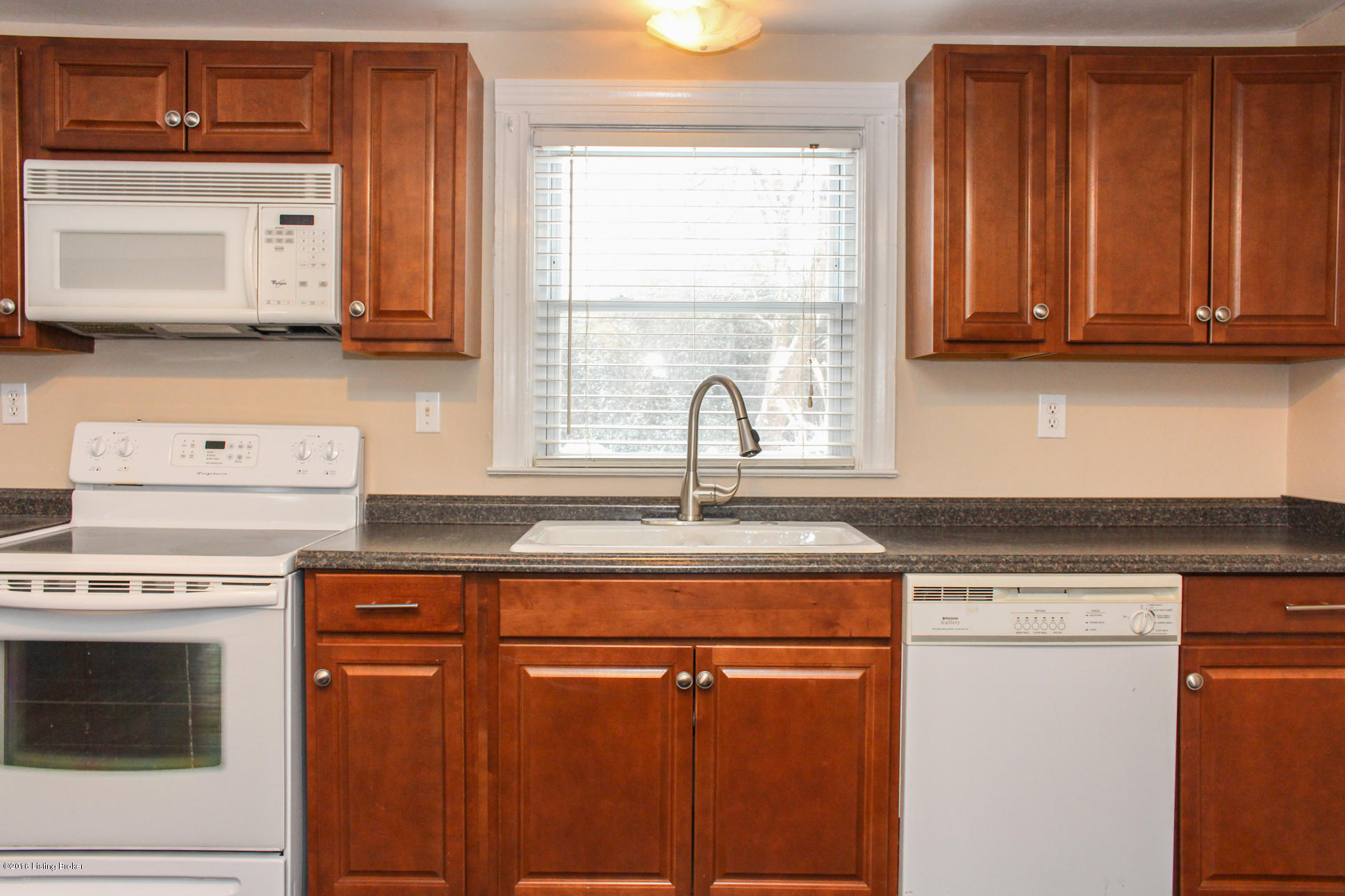 4628 Dover Road Louisville, KY 40216 - Photo 12 of 27 lots of cabinet and counter space for your cooking needs