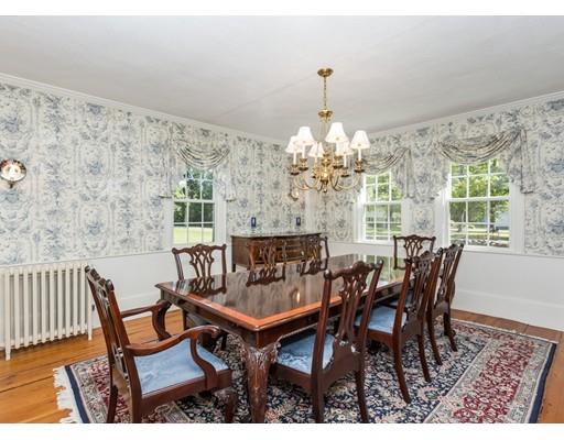 128 Somers Road Hampden, MA 01036 - Photo 8 of 30 a view of a dining room with furniture and chandelier