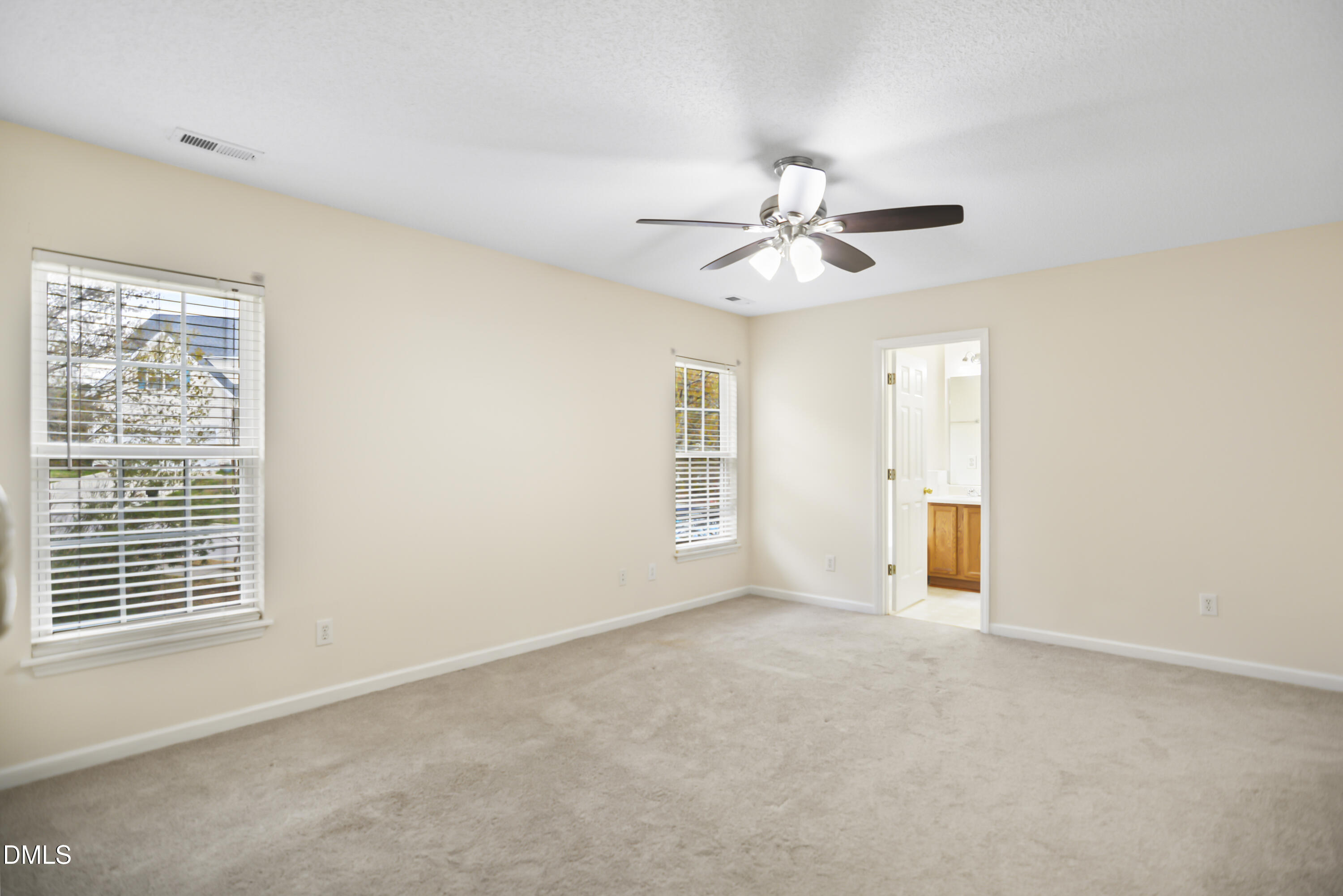 2241 Spruce Shadows Lane Raleigh, NC 27614 - Photo 14 of 29 a view of an empty room with a window