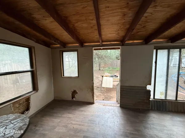 a view of entryway with wooden floor