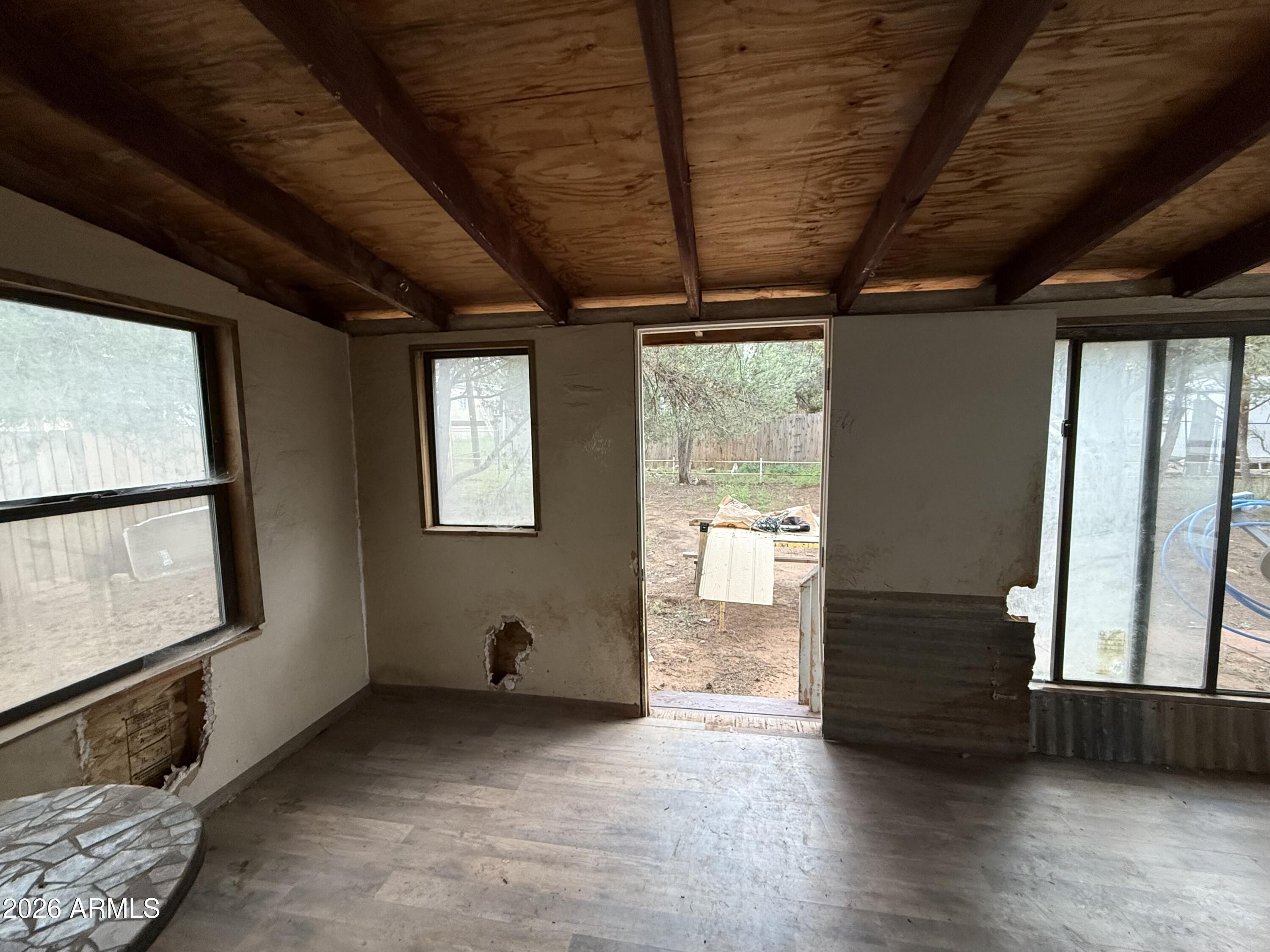2953 Wildcat Trail Overgaard, AZ 85933 - Photo 15 of 22 a view of entryway with wooden floor