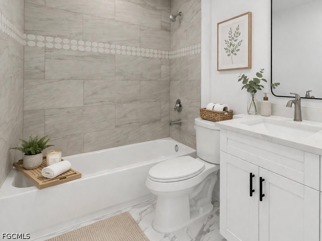 7644 19th Terrace LaBelle, FL 33935 - Photo 4 of 12 a bathroom with a sink a toilet and a bathtub