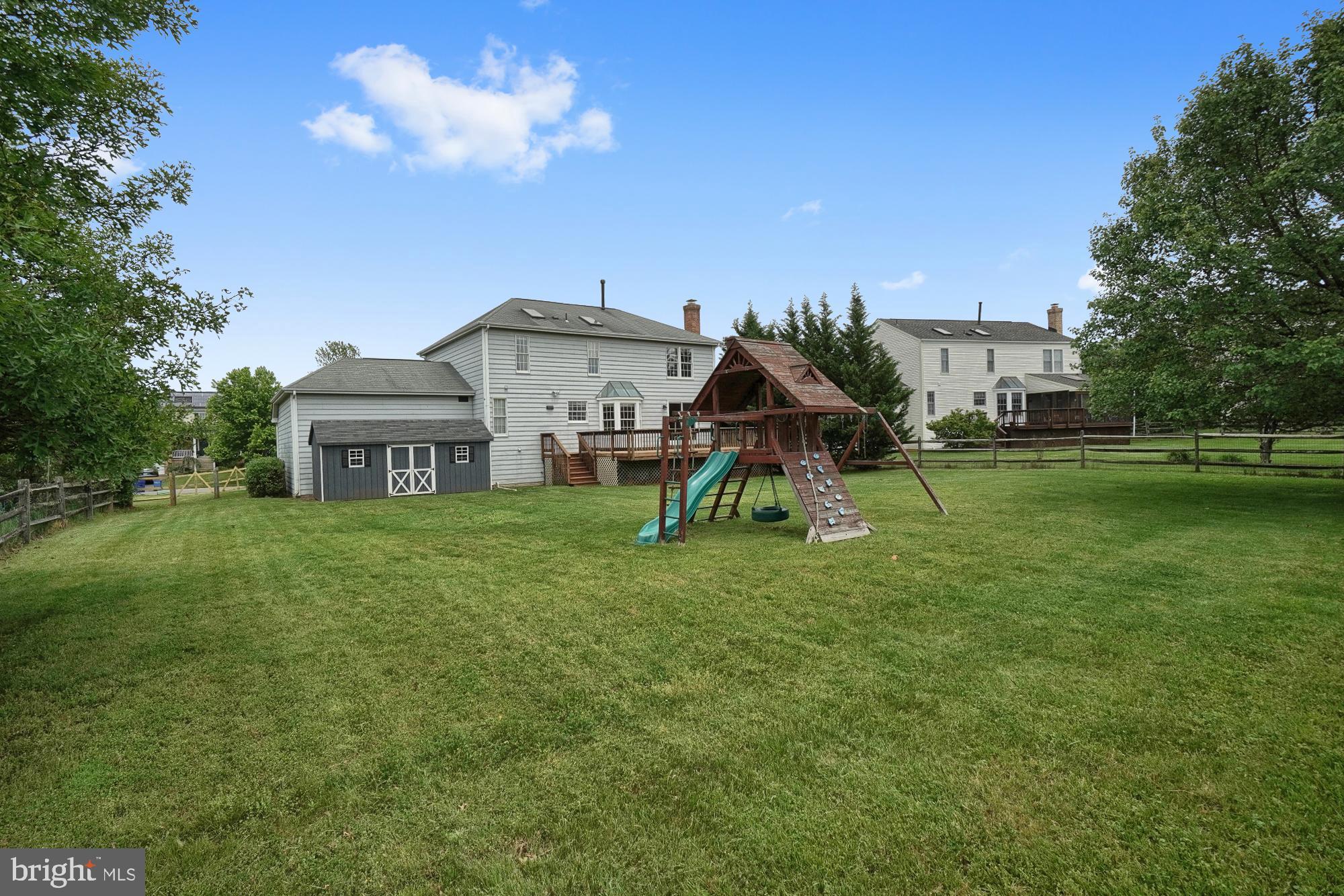 17205 Spates Hill Road Poolesville, MD 20837 - Photo 11 of 59 a view of a house with a big yard