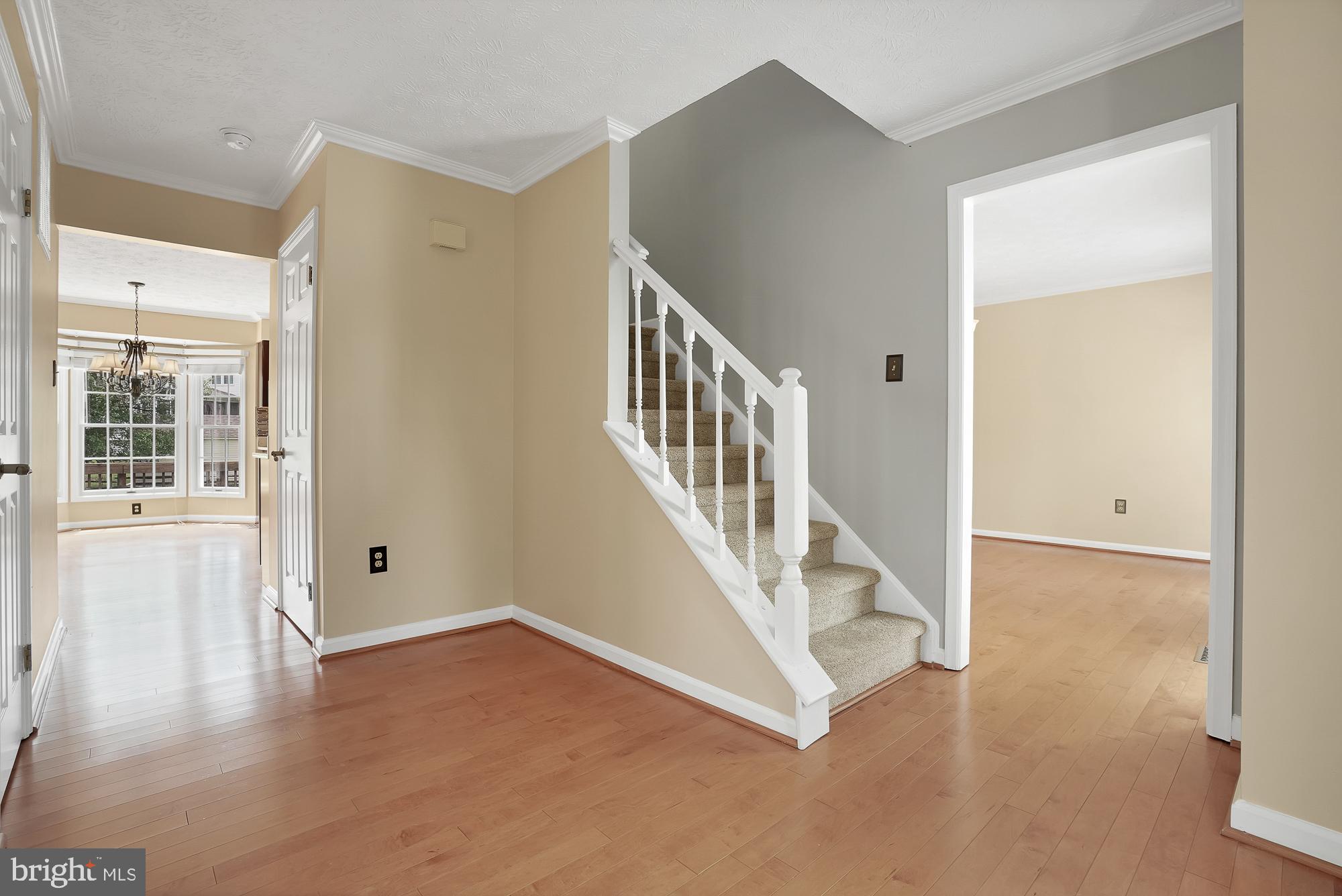 17205 Spates Hill Road Poolesville, MD 20837 - Photo 30 of 59 a view of an entryway with wooden floor and windows