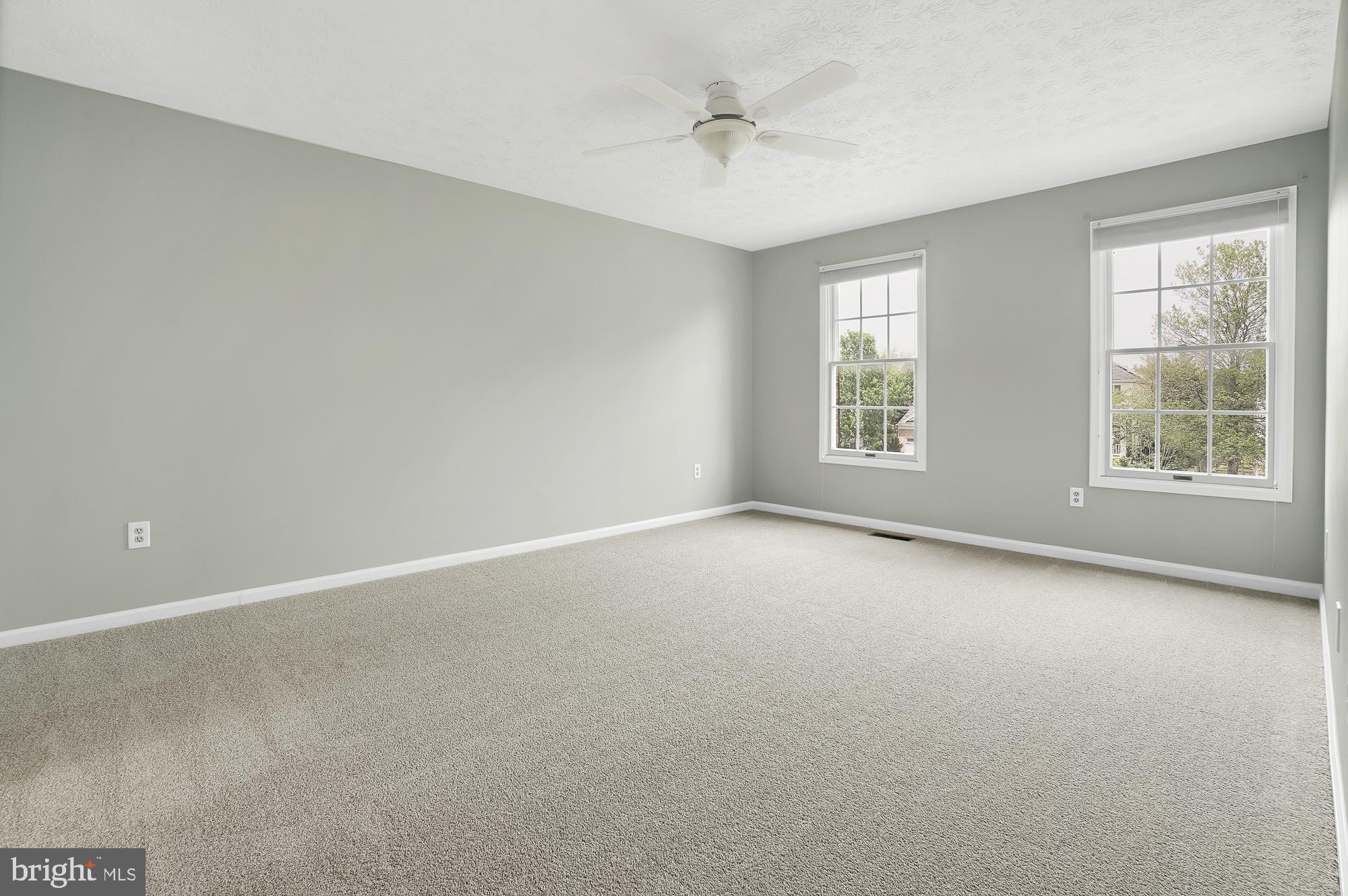 17205 Spates Hill Road Poolesville, MD 20837 - Photo 32 of 59 a view of an empty room with a window