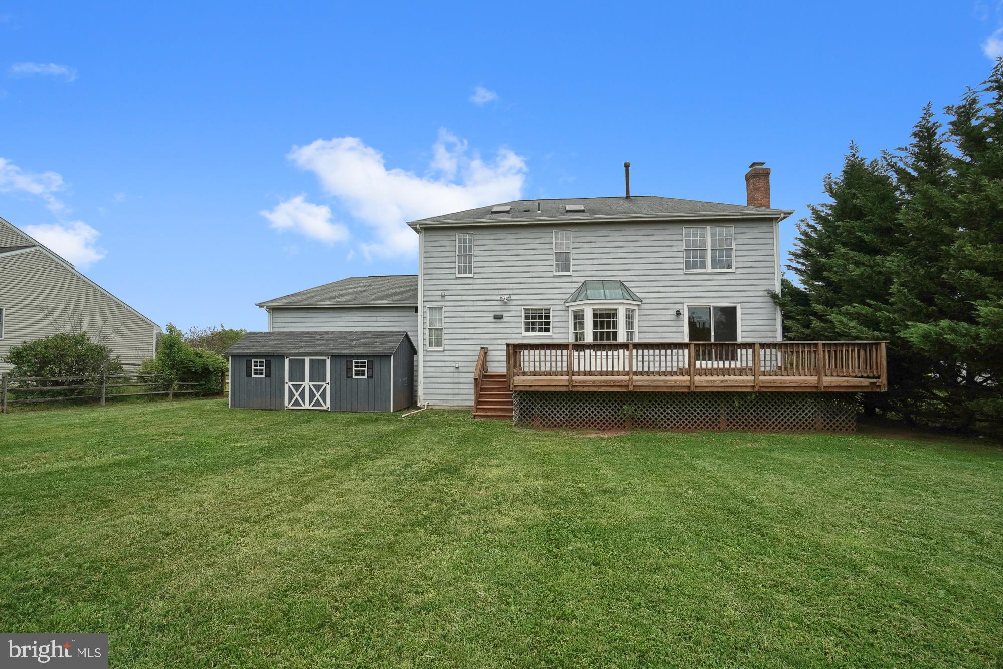 17205 Spates Hill Road Poolesville, MD 20837 - Photo 10 of 59 a view of a house with a yard