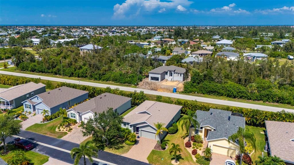 24604 Rio Villa Lakes Circle Punta Gorda, FL 33950 - Photo 7 of 28 an aerial view of residential houses with outdoor space and river