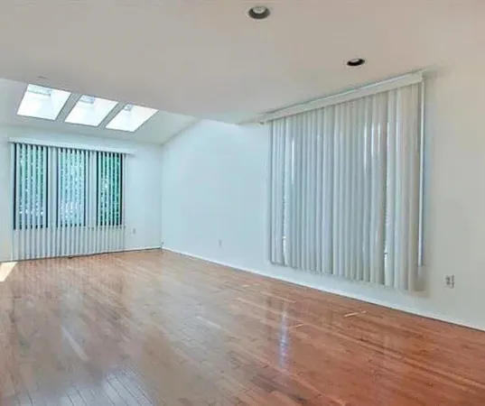 a view of car parked on the side of road