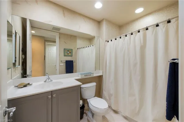 a view of a workspace with furniture and a workspace