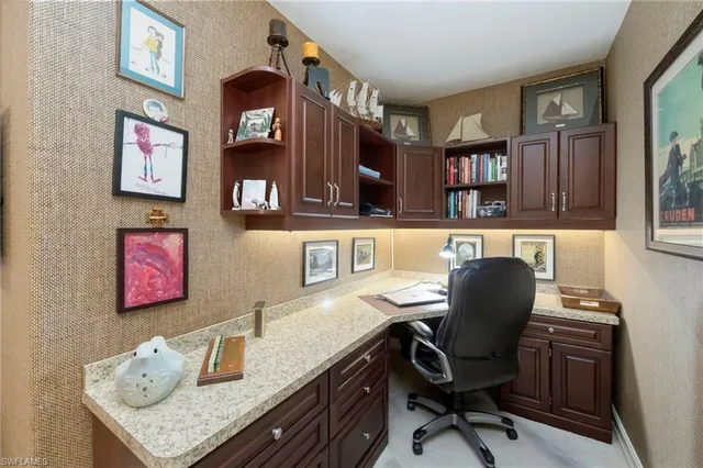 a room with a sink a washer and dryer