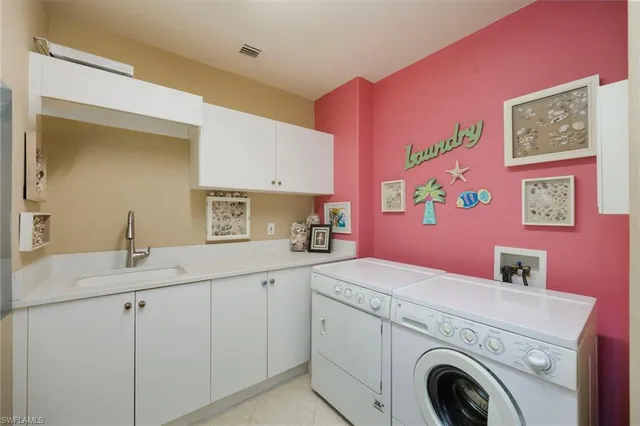 a view of a swimming pool with a yard and palm trees