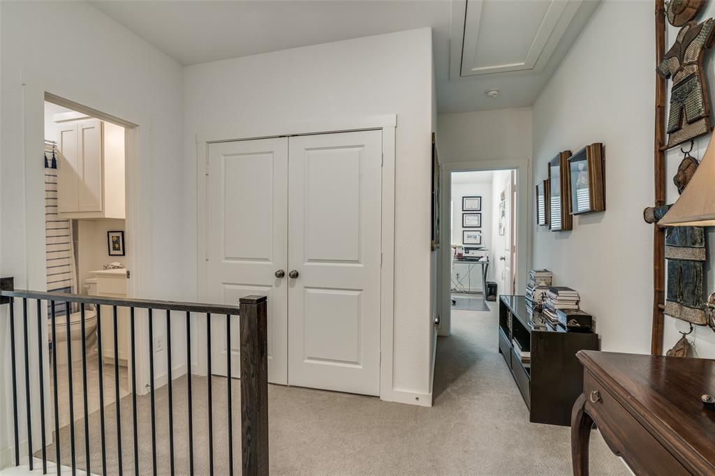 2724 Splendor Lane Little Elm, TX 75068 - Photo 13 of 25 a view of a hallway to a livingroom with furniture