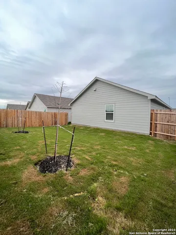 a house view with a garden space