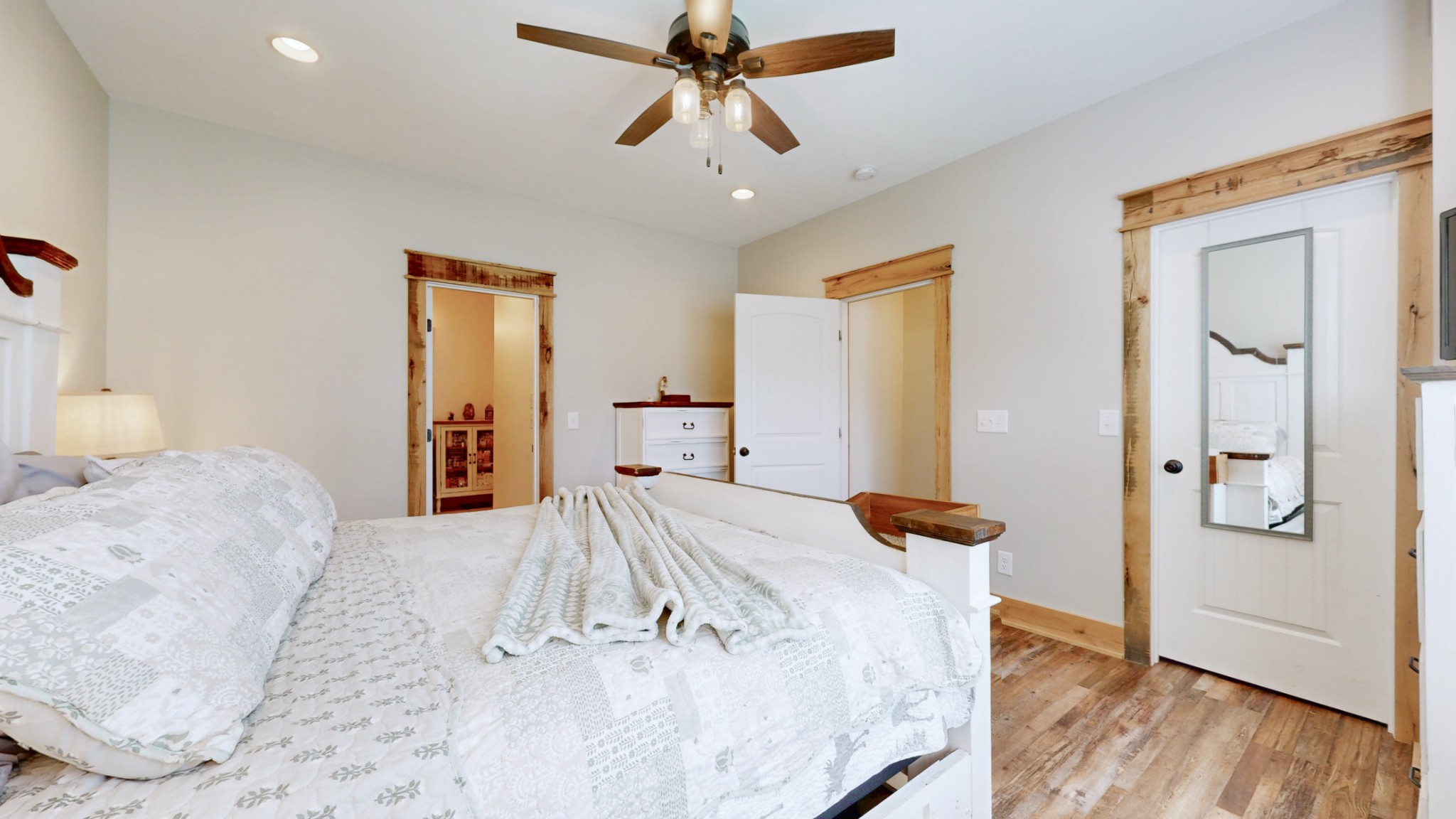 601 King Ridge Road Dowelltown, TN 37059 - Photo 23 of 49 a bedroom with a bed and wooden floor