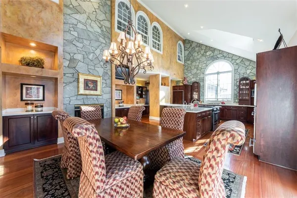 a view of a dining room with furniture