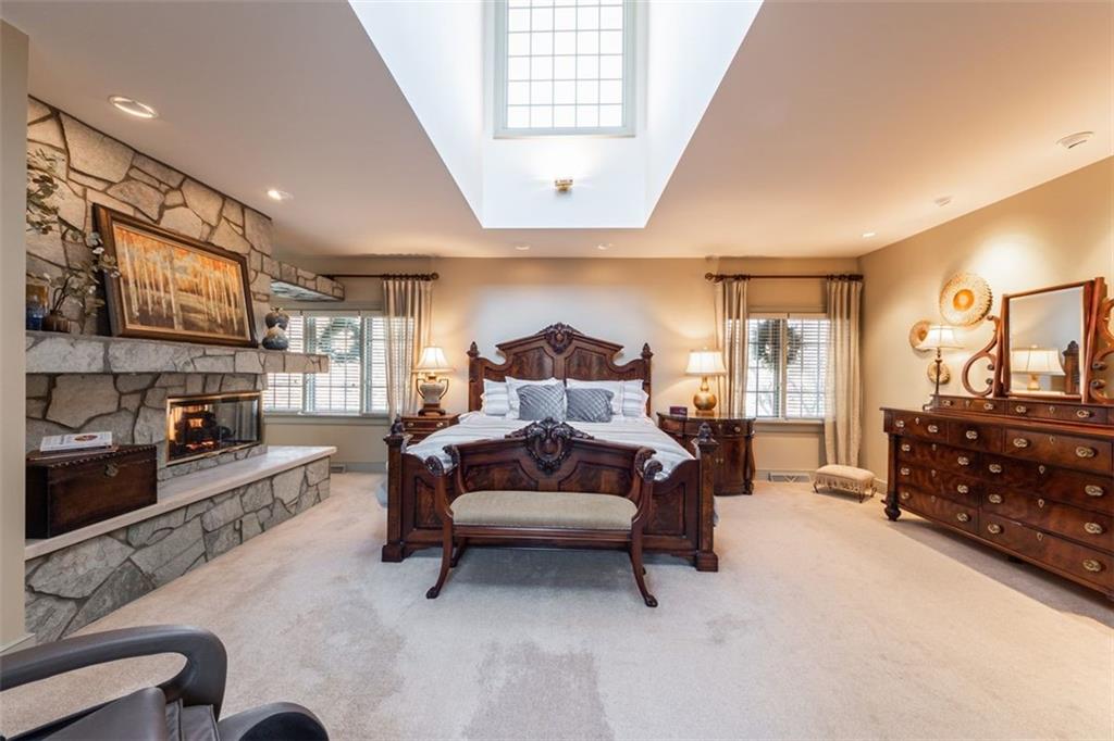 310 Mingo Road Wexford, PA 15090 - Photo 21 of 45 a spacious bedroom with a bed couch and dresser