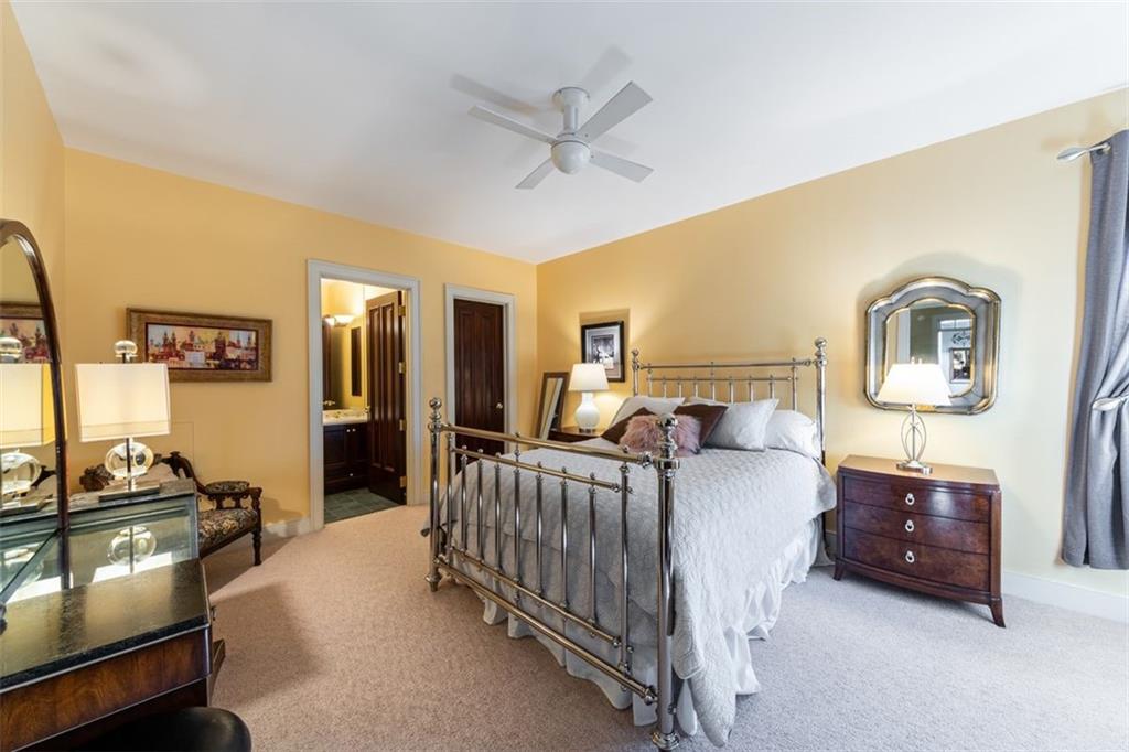 310 Mingo Road Wexford, PA 15090 - Photo 33 of 45 a bedroom with a bed and ceiling fan