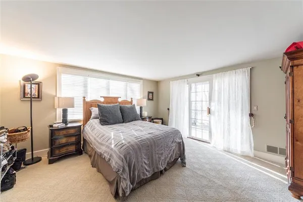 a living room with furniture and a couch