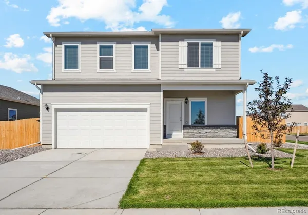 front view of house with a yard