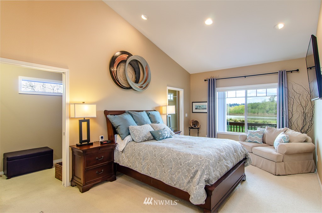 15 South Bank Road Elma, WA 98541 - Photo 11 of 32 a bedroom with a bed and window