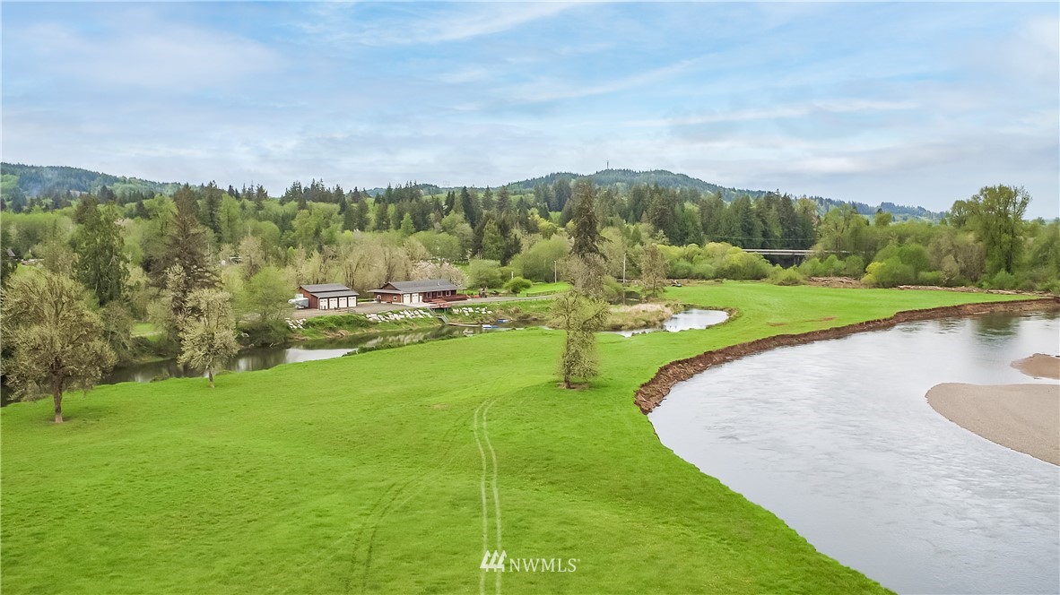 15 South Bank Road Elma, WA 98541 - Photo 31 of 32 a view of a garden with houses