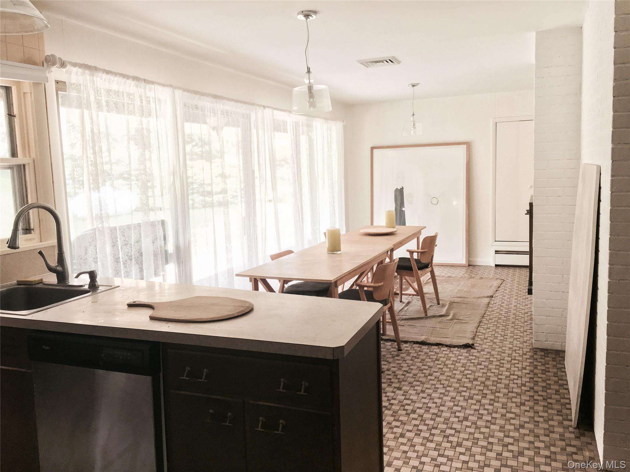 68-78 Ridge Road Clinton Corners, NY 12514 - Photo 18 of 50 a view of a a dining room with a table and chairs