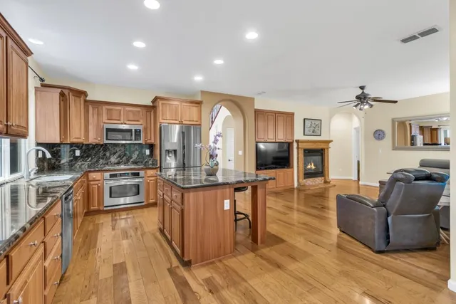 a en suite bathroom with a sink a toilet and mirror