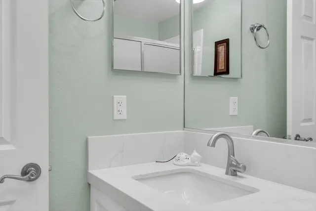 a view of a hallway with the wooden floor
