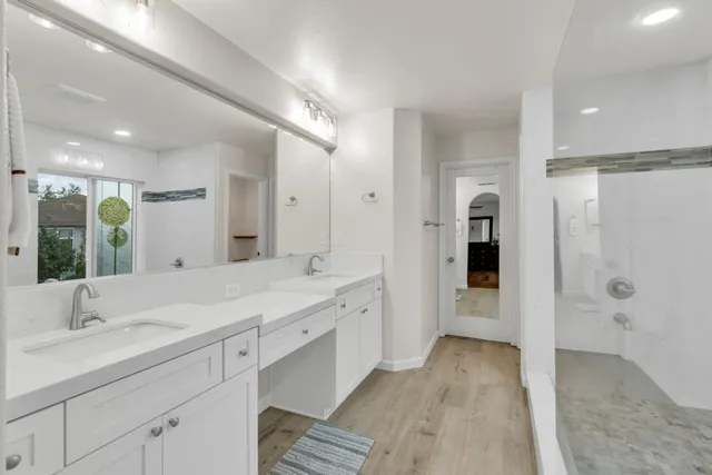 a view of a living room and a balcony