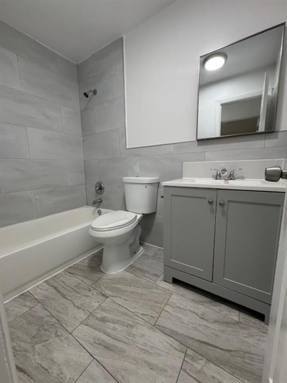 481 Banks Road, Unit 1 Margate, FL 33063 - Photo 9 of 13 a bathroom with a toilet sink and mirror