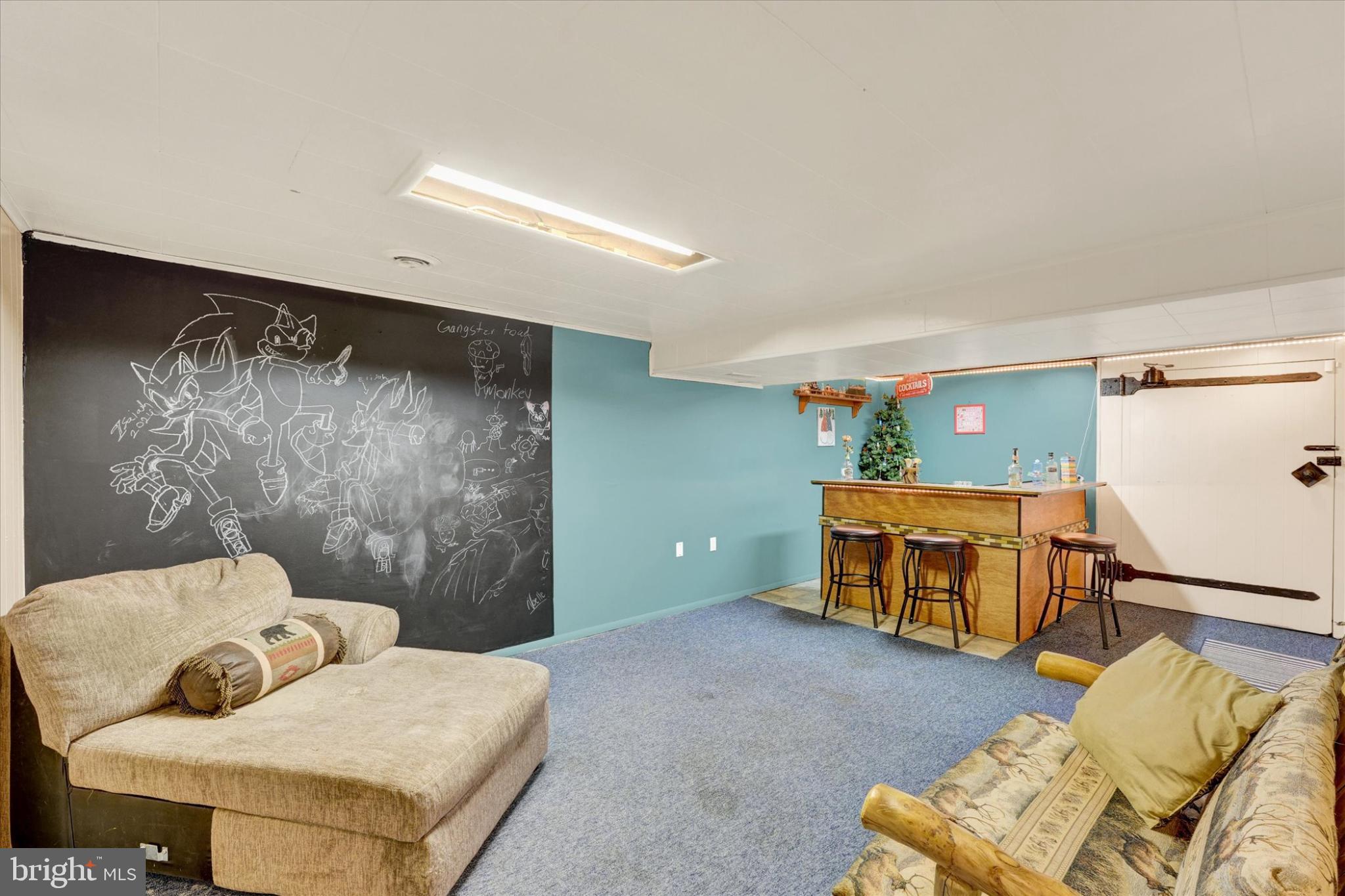 809 Van Reed Road Wyomissing, PA 19610 - Photo 18 of 25 Versatile basement retreat with creative flair.