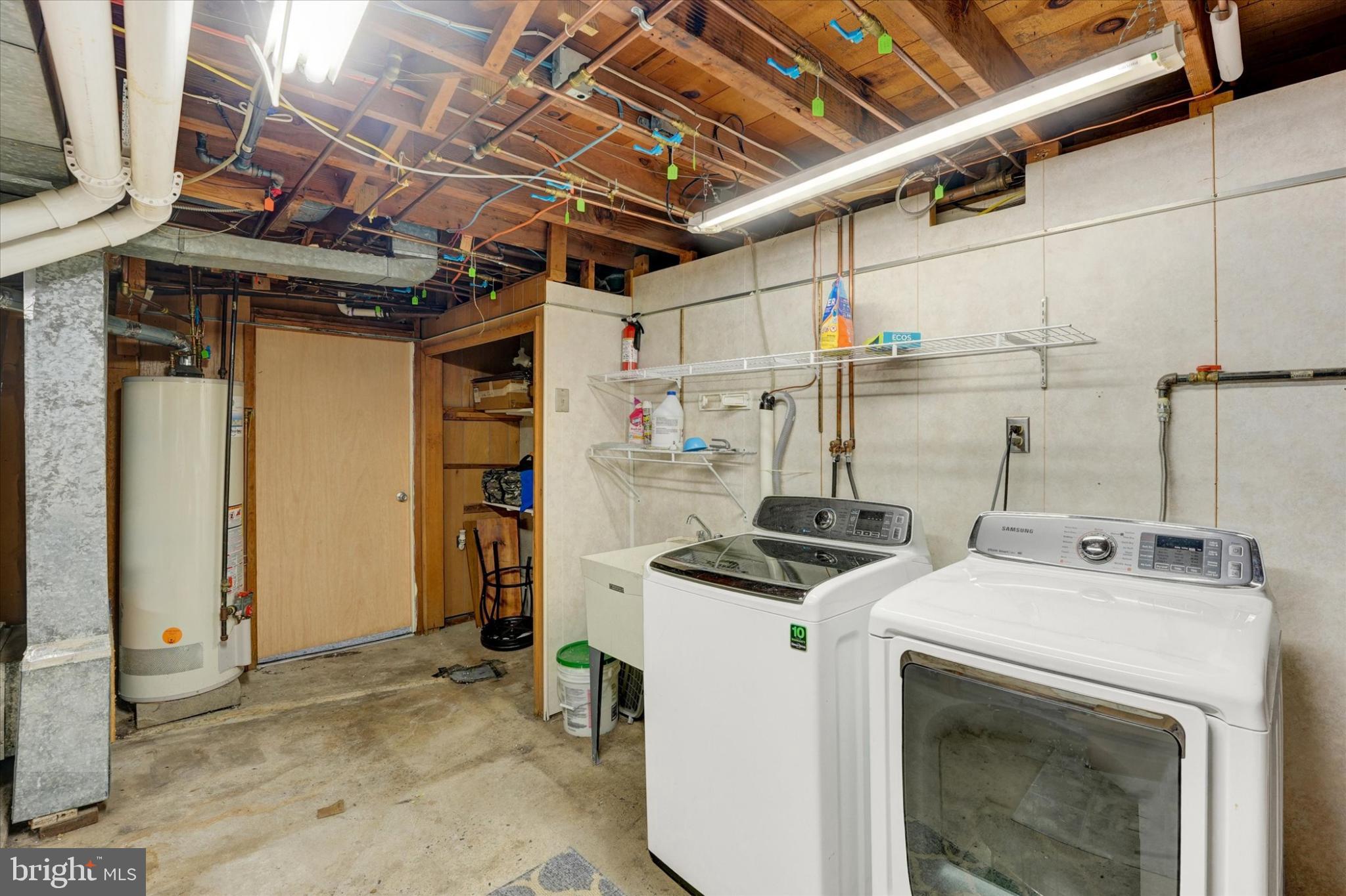 809 Van Reed Road Wyomissing, PA 19610 - Photo 20 of 25 Functional laundry space with ample storage.
