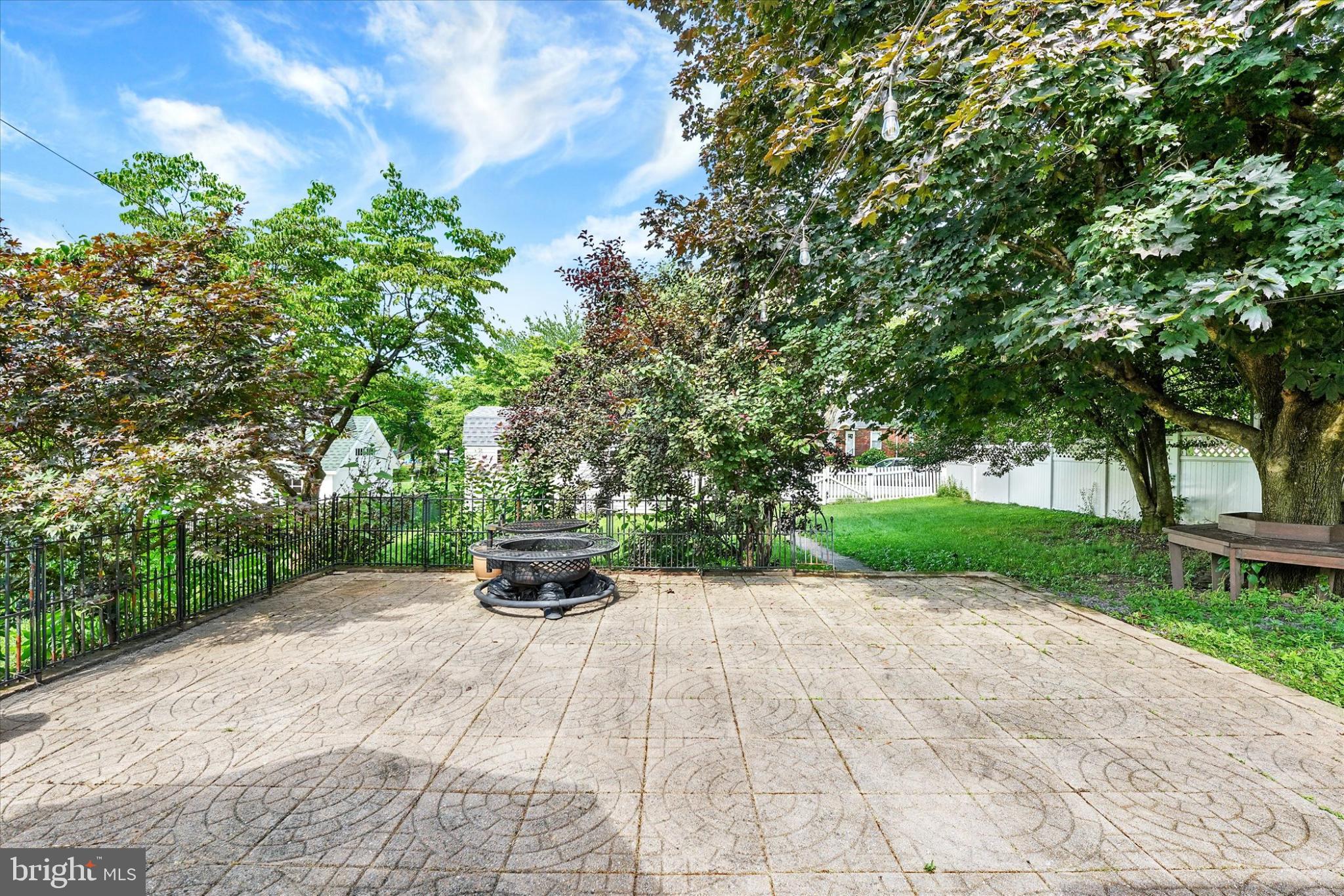 809 Van Reed Road Wyomissing, PA 19610 - Photo 21 of 25 Serene outdoor retreat with lush greenery.