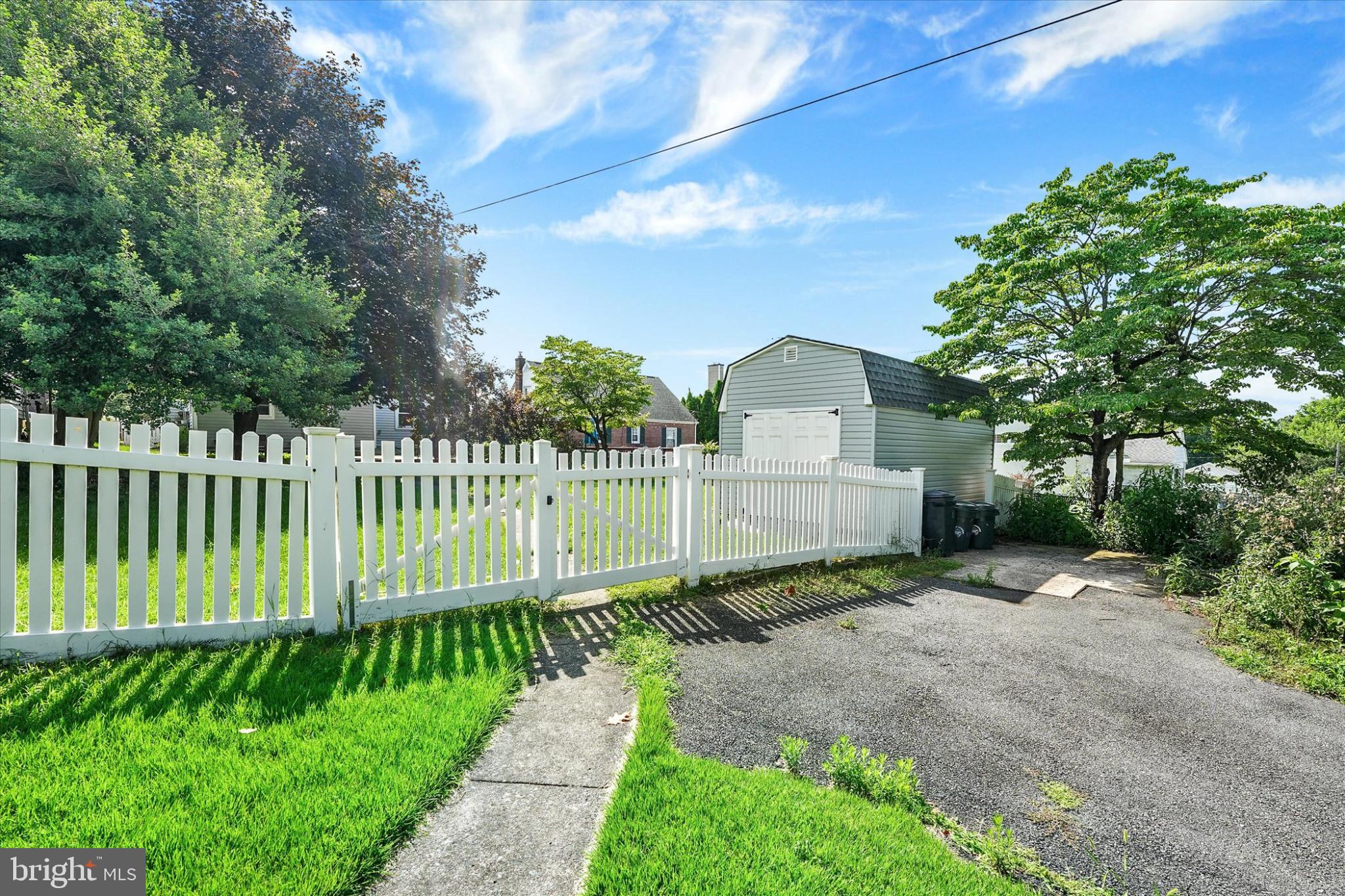 809 Van Reed Road Wyomissing, PA 19610 - Photo 25 of 25 Charming yard with white picket fence.