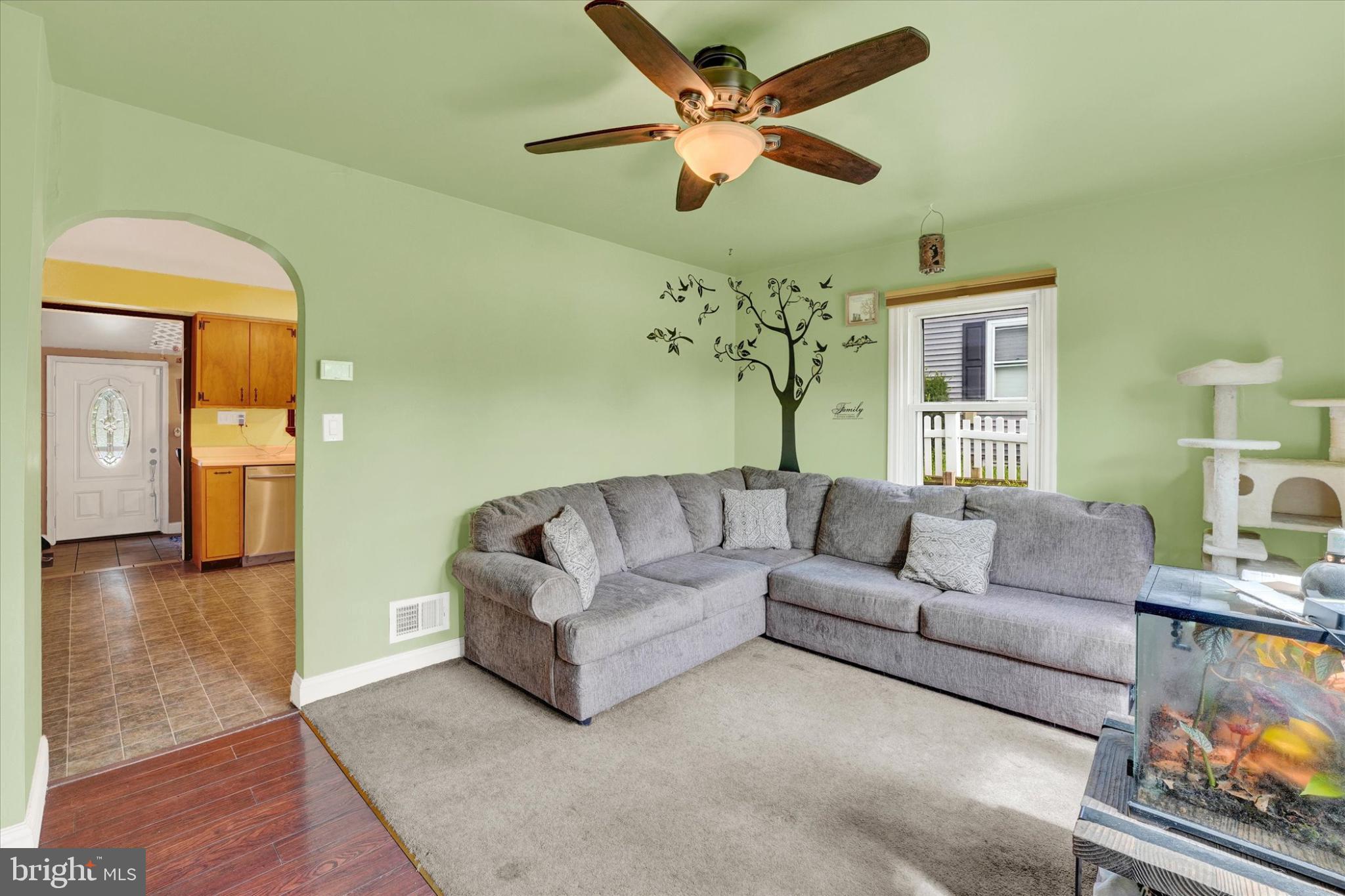 809 Van Reed Road Wyomissing, PA 19610 - Photo 5 of 25 Charming living space with vibrant green walls.