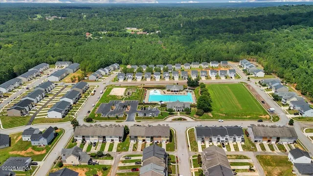 a view of a garden with an outdoor space